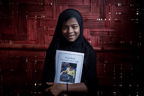 Dilnewaj with her school books.